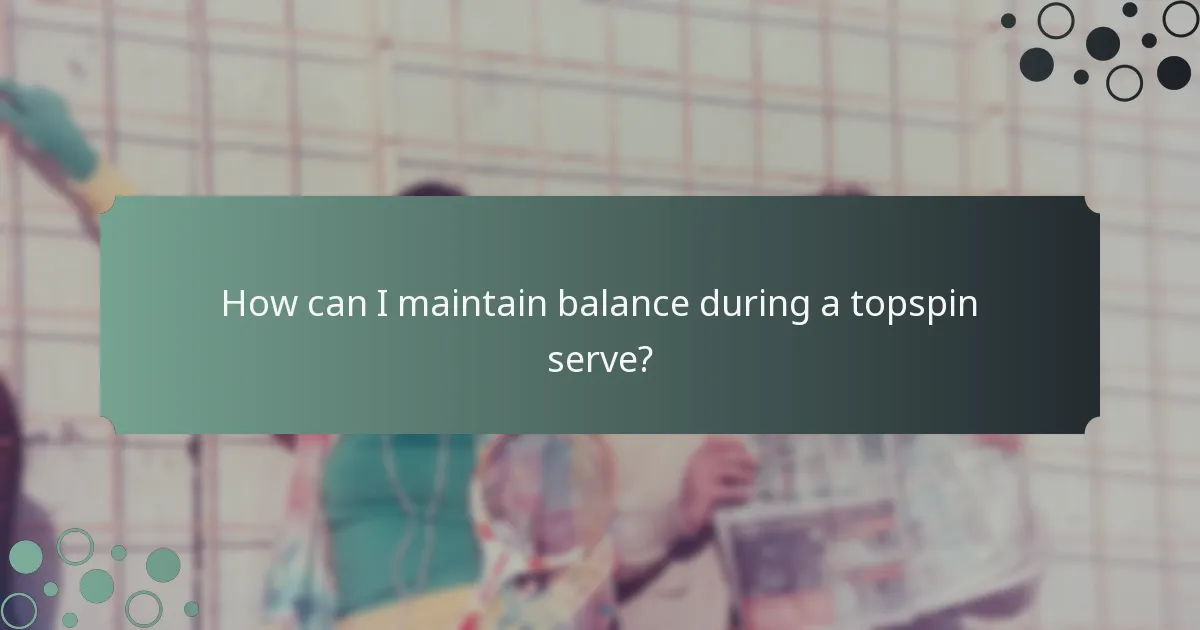 How can I maintain balance during a topspin serve?
